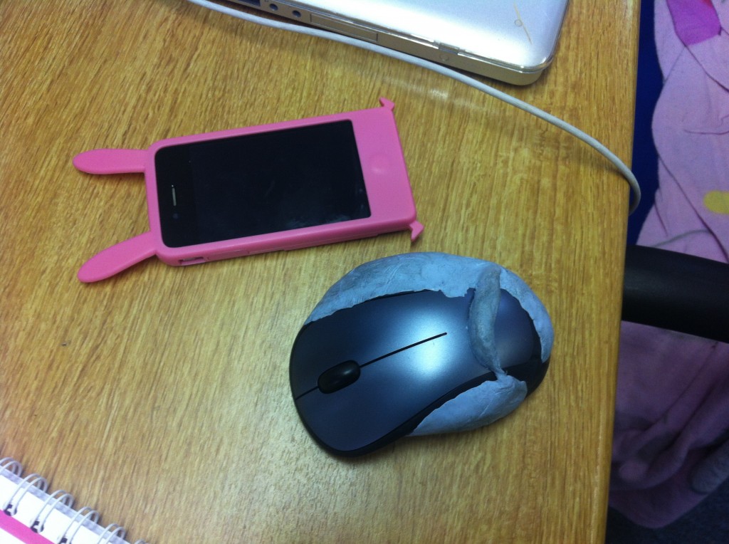 Blu-tac moulded onto mouse